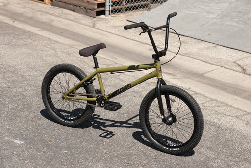 Side view of the Sunday Wavelength complete bmx bike in green
