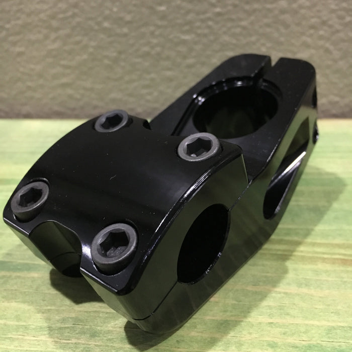 Top and side view of the Odyssey Aaron ross Boss V2 stem in black, bmx stem