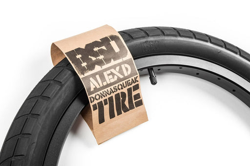 Side view of the BSD Alex Donnachie Donnasqueak tire in black