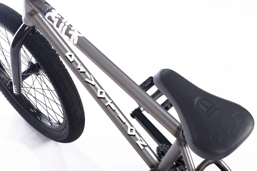 close up view of the Cult Devotion in raw, Full Chromoly bmx bike