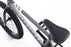 close up view of the Cult Devotion in raw, Full Chromoly bmx bike
