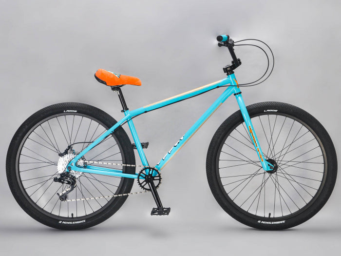 side view of 27.5" mafia bomma in teal