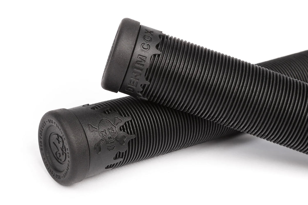 close up view of the BSD Grime grips in black, Do all bike grips fit all bikes, what are the grips on a bike called, what do odi grips stand for, are thicker bike grips better, How do I know what grips fit my bike, Do all handlebar grips fit all bikes, are all bike grips the same diameter, are all grips the same size, what size grips do I need, how do I pronounce Ergon, what are grips on a bike, what are the handles on a bike called, what are the parts of a bike called, what is the bike holder called