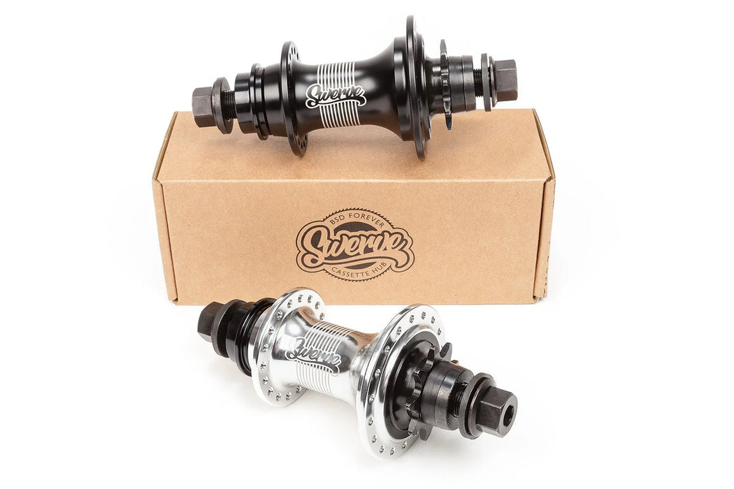 Two BSD Swerve hubs with a branded box on a white background, Complete view of a  hub of a bike.