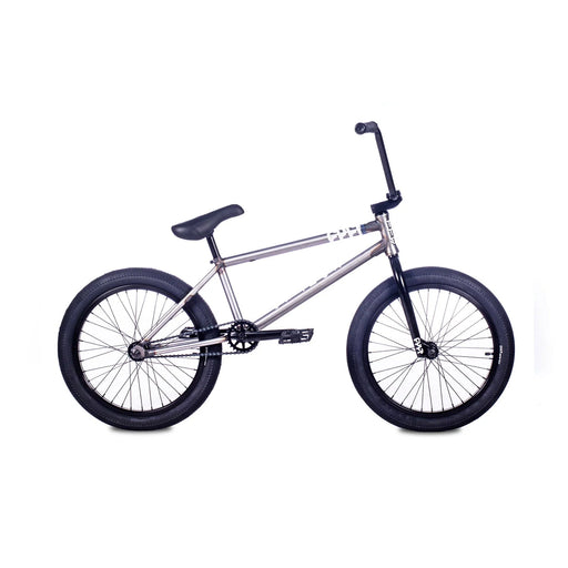 side view of the Cult Control Freestyle bike in Raw, Cult Control beginner BMX bike with chromoly frame