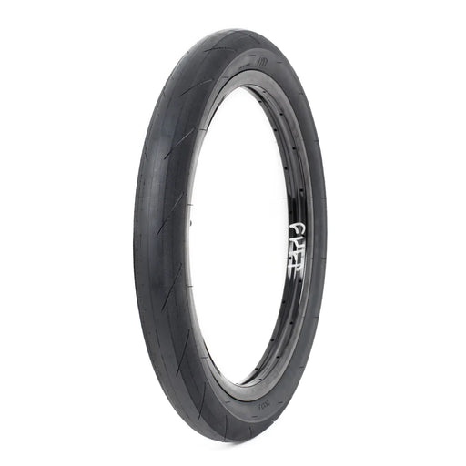 Front and side view of the Cult Fast Loose tire in black