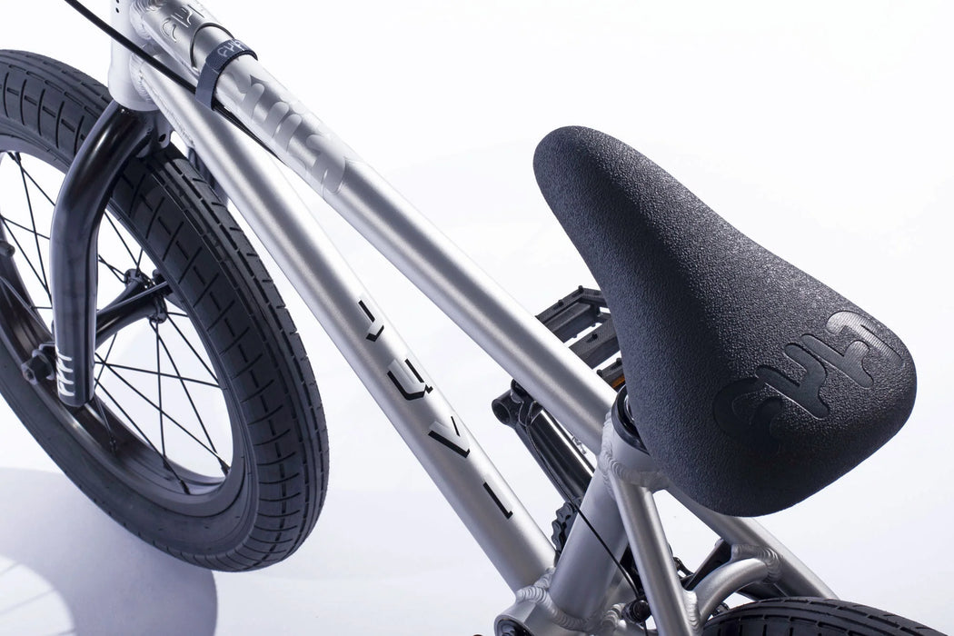 Close up view of the 18" Cult Juvenile complete bike in silver, bmx bike for 9 years old