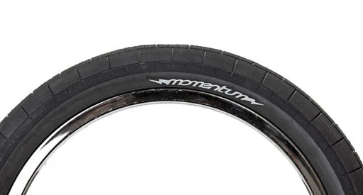 Side view of a 20 x 2.4 tire on a BMX bike with thick tires
