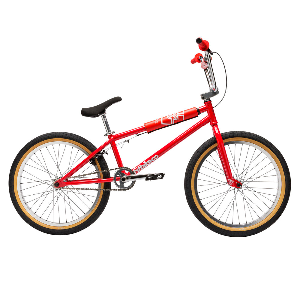 Side view of the Fitbikeco 22 inch bmx bike in red.