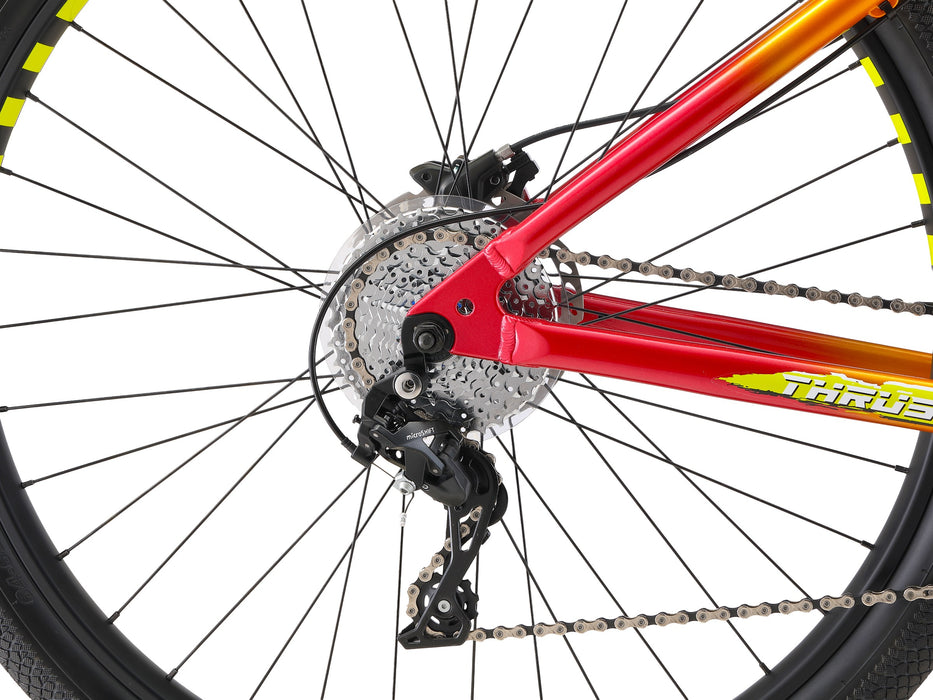 Side view of the orange Mafia thrust rear wheel and derailleur 