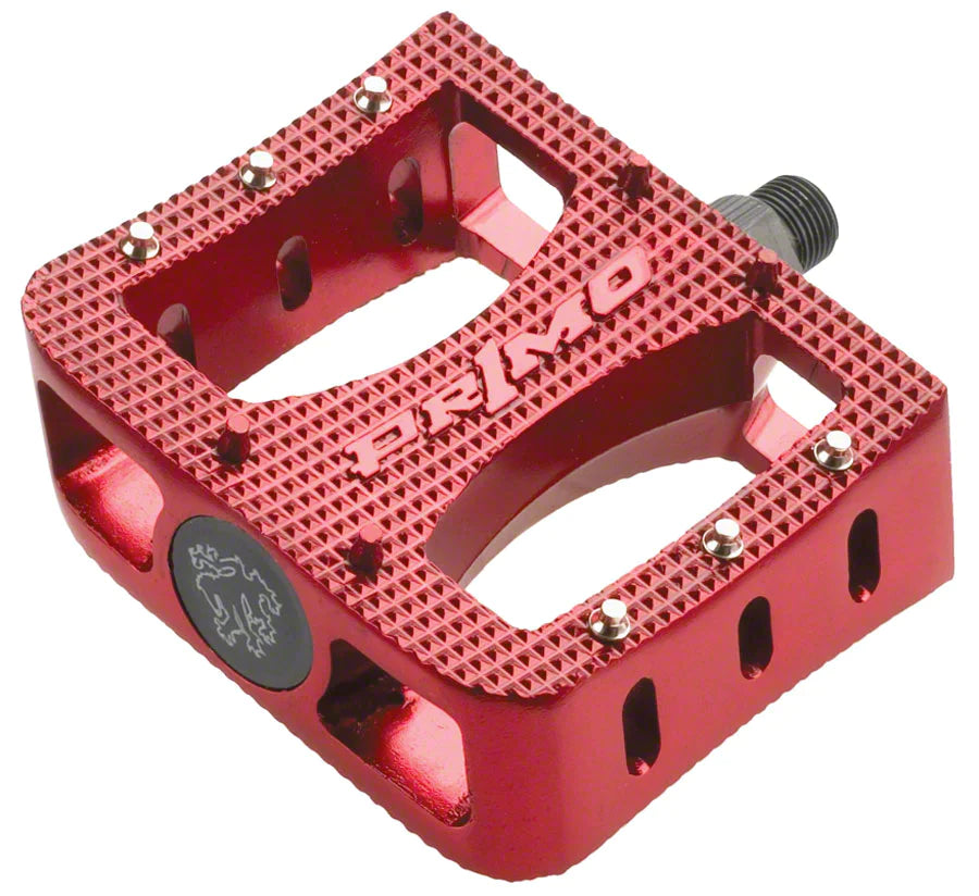 Primo Super Tenderizer Alloy BMX pedals in red, close up showing aggressive grip pins
