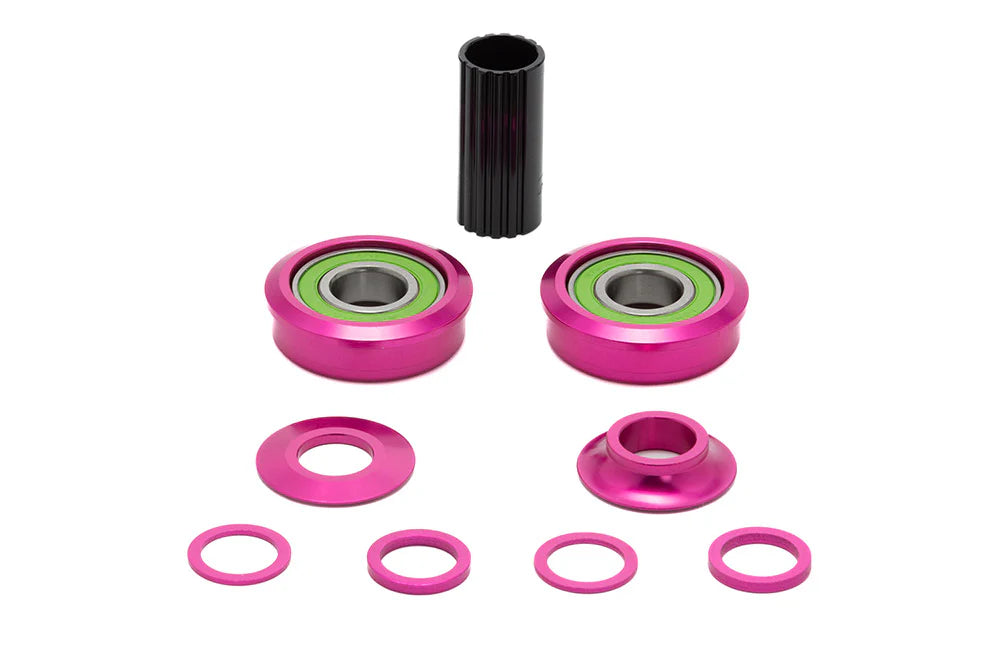 Theory American Bottom bracket in pink, What is a bicycle crank, how do I know if my cranks are worn out? Does a bike have a crank, what is a crank in simple terms, do all cranks fit all bikes, What’s the difference between crankset and cranks, what is the definition of a crankset, can you put any crankset on a bike, does crankset make a difference, Is it better to have shorter cranks or longer cranks, How much does it cost to replace a bike crank, is a crankshaft worth replacing, what’s the most expensive 