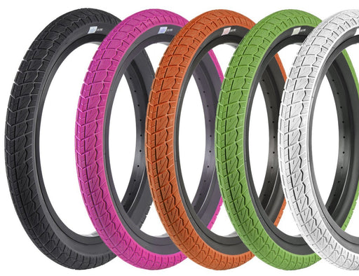 Front and side view of the Sunday current tire in black, pink, orange, green, white