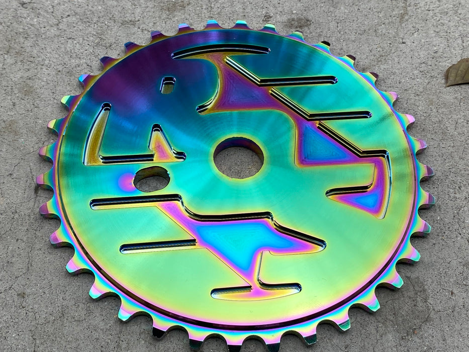Front angle view of the Ride out supply ROS Sprocket in oil slick, big bmx sprocket