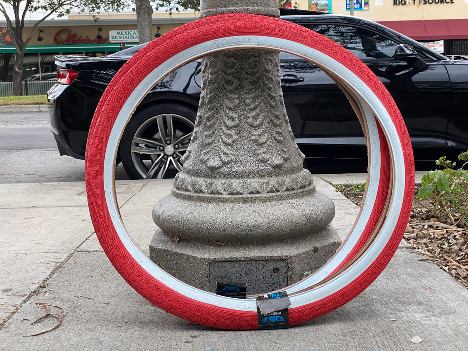 side view of the 29" Bozack tire in red with white wall
