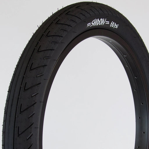 front & side view of the Shadow Conspiracy Strada Nuova tire in black