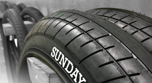 Side & front view of the Sunday Street sweeper tires in black