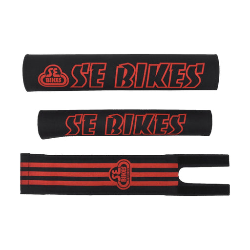 Side view of the SE Bikes pad set in black and red